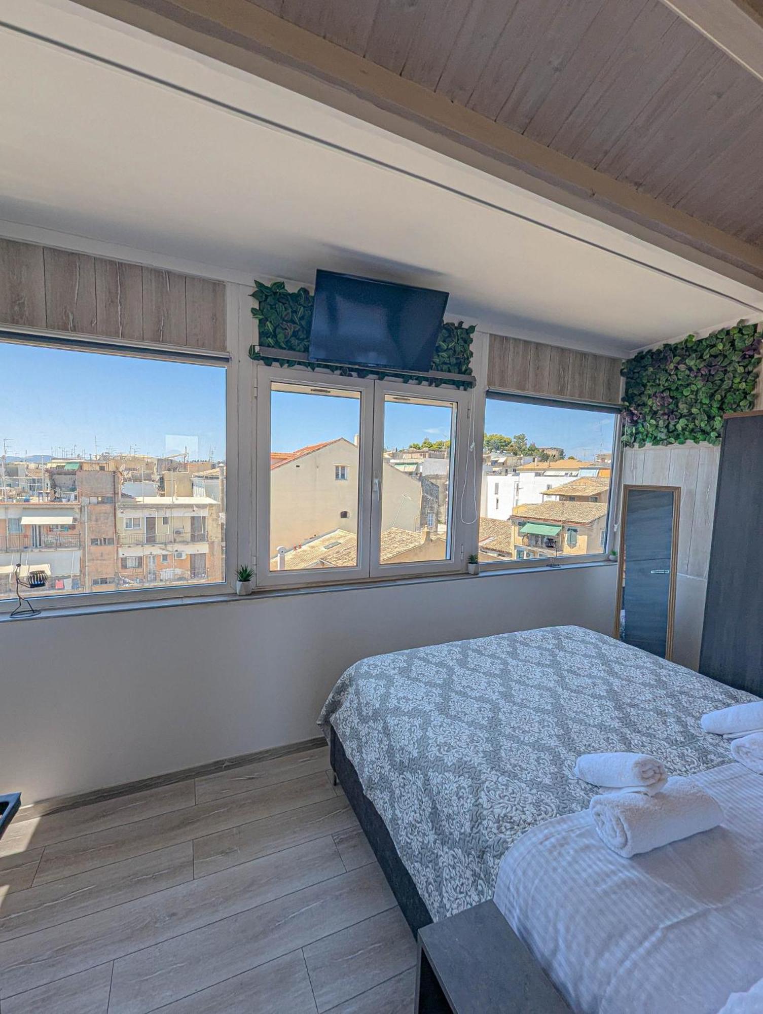 Ionian Pearl Apartments And Suites Corfu  Экстерьер фото